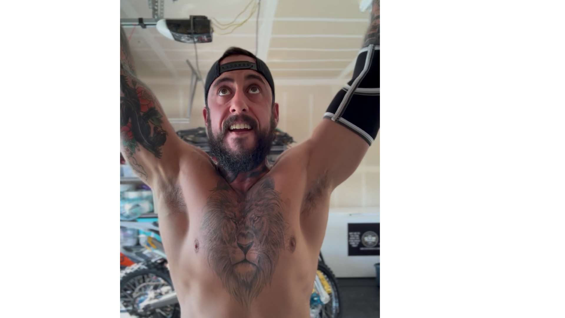 Man celebrating fitness progress and reaching his goals with arms raised after a personal training session in Chico, CA