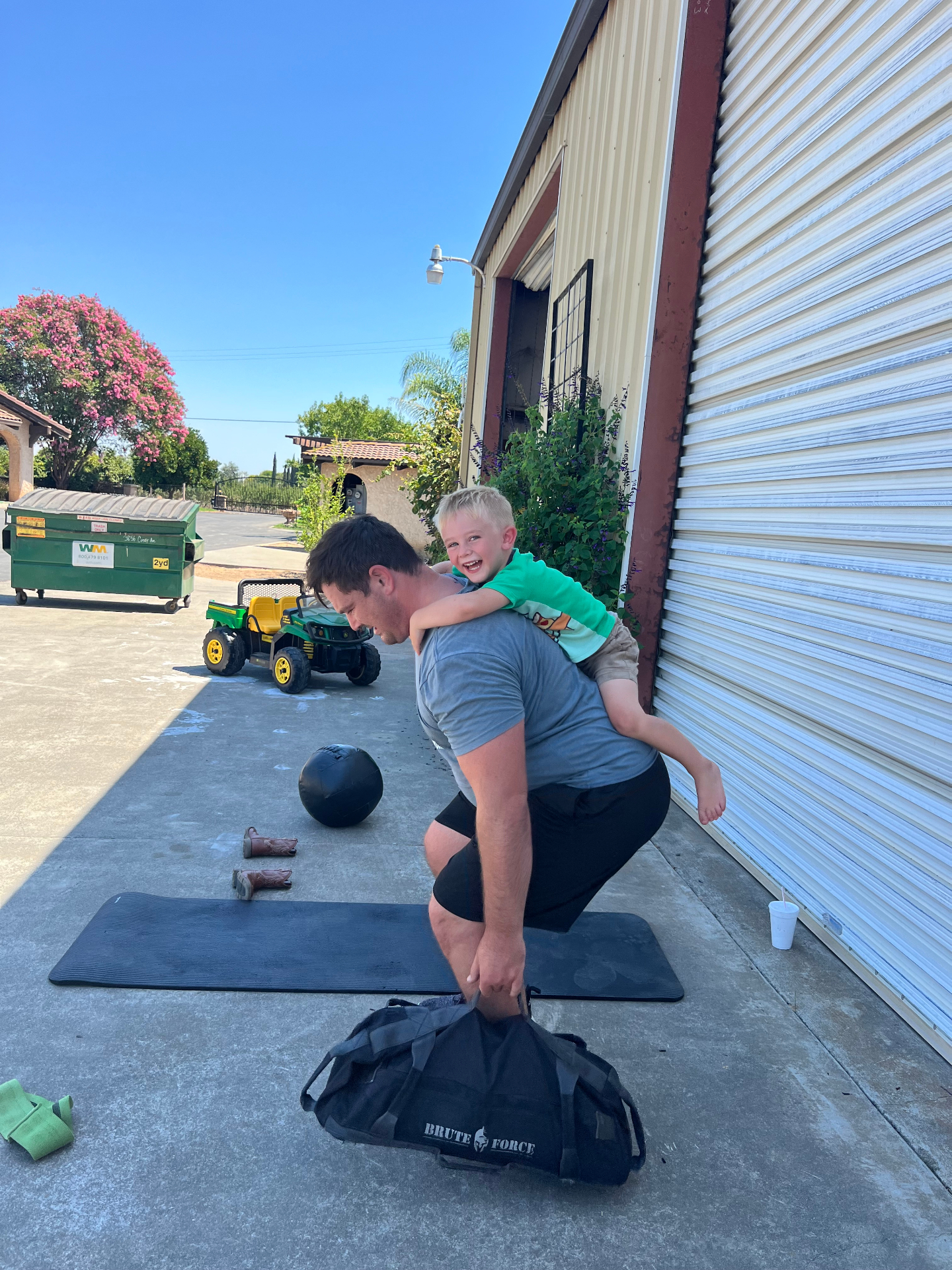 James training a weight-loss client outdoors with resistance bands in Chico, CA